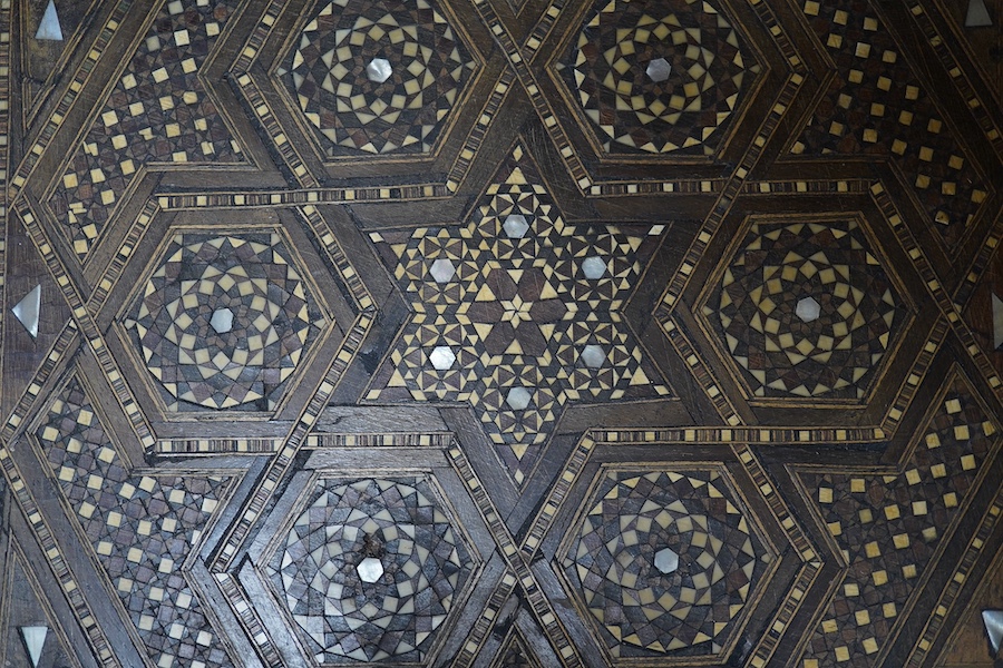 A 20th century Damascus ware heavily inlaid box, 31cm x 31cm. Condition - ball foot missing, inlay good